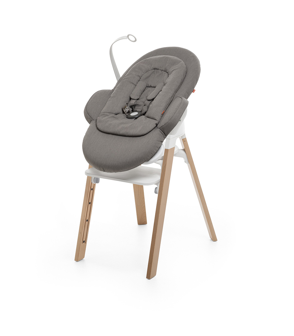 Bouncer, Blue. Mounted on Stokke Steps highchair.